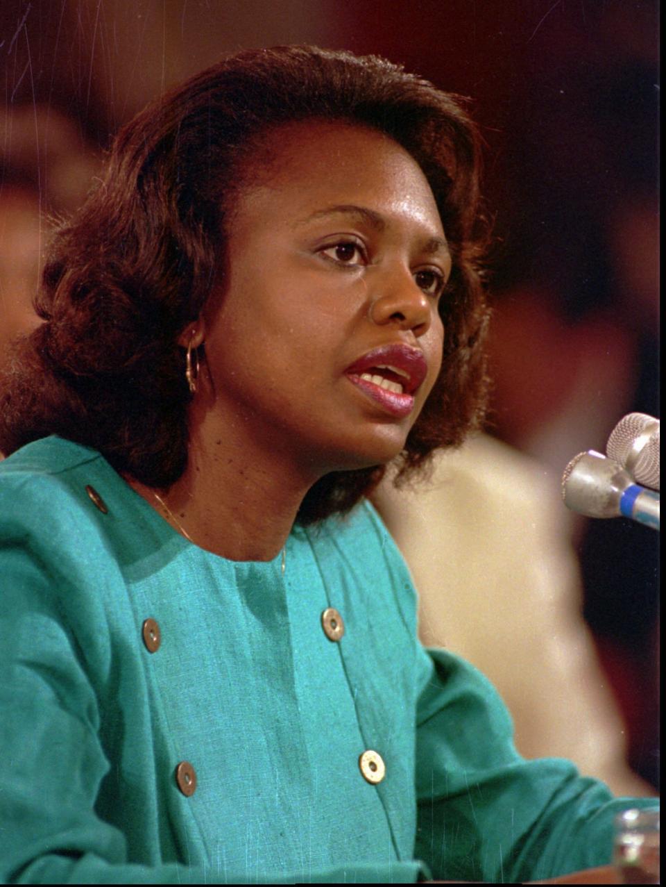 Law professor Anita Hill testifies before the Senate Judiciary Committee on Capitol hill Oct. 11, 1991. In a 1994 book titled " Strange Justice, The selling of Clarence Thomas," written by two Wall Street Journal reporters, the authors revealed that Thomas' volatile Supreme Court confirmation hearings raise fresh questions about his denial that he had talked dirty to Hill while she worked for him as an aide at two government agencies in the 1980s.