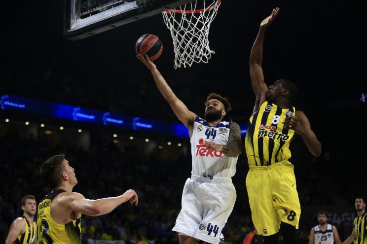 Fenerbahce's Ekpe Udoh, right, tries to stop Real Madrid's Jeffery Taylor during the Final Four Euroleague semifinal in May. (AP)