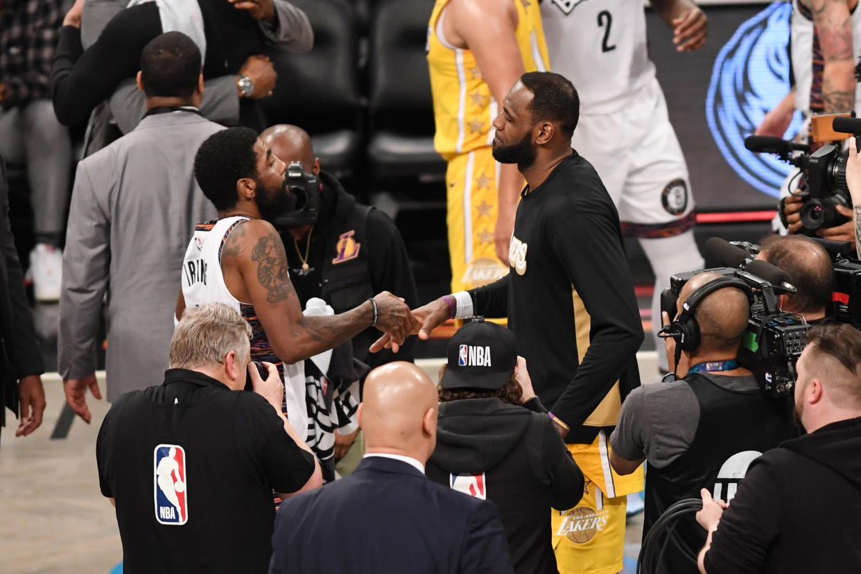 LeBron James and Kyrie Irving will have to wait for another chance to become teammates again. (Photo by Matteo Marchi/Getty Images)