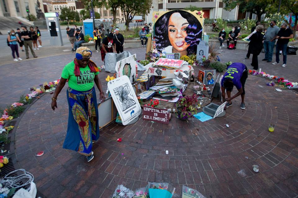 A Breonna Taylor memorial in downtown Louisville, Ky., is covered by a tarp to protect it from rain in September 2020.