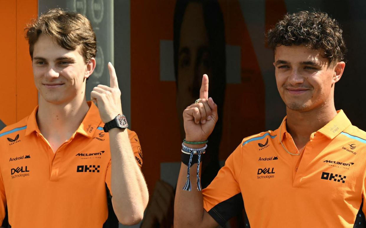 Oscar Piastri and Lando Norris point their fingers upwards during a photo shoot before the Formula One Azerbaijan Grand Prix in Baku - Lando Norris: I do not expect Oscar Piastri to give up wins but I am grateful McLaren will favour me