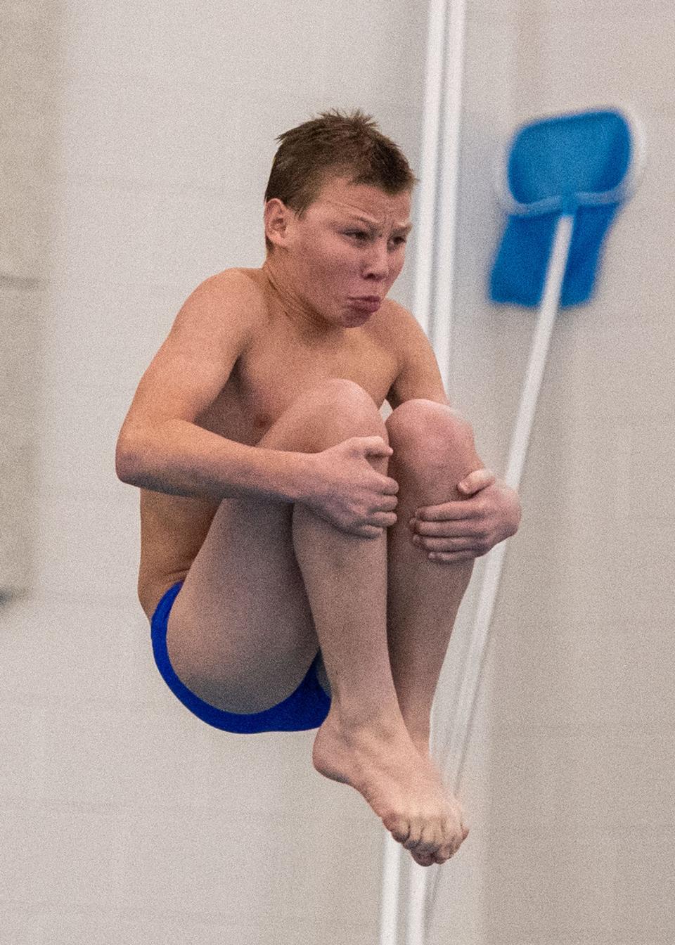 Spring Grove’s Elijah Henning competes in the District 3 Class 3A diving competition at Dover High School on Saturday, Feb. 24, 2024.