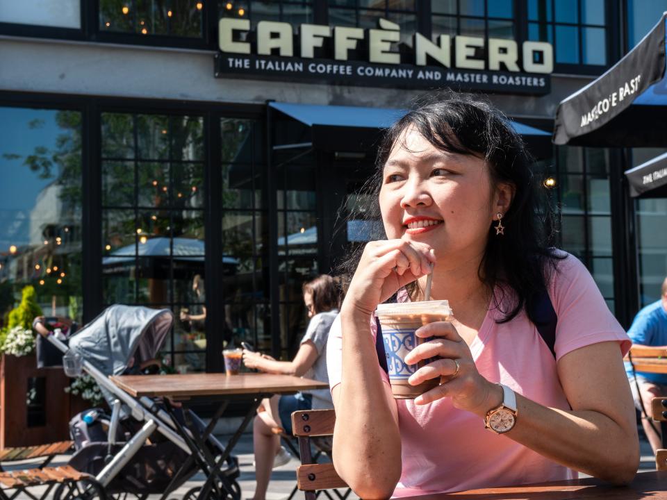 Woman drinking coffee in Boston, Massachusetts.