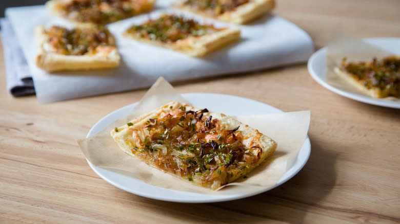 onion tart slice on dish