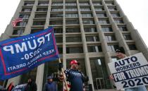 Supporters of President Donald Trump gather to protest the U.S. Senate impeachment trial of the president in downtown Detroit