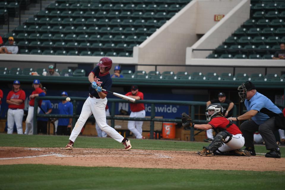 Santa Fe's Trent Henley (West) attempts to make contact versus the East team in the 37th annual Polk County Baseball All-Star Game at Tigertown on Tuesday. The West would end up winning 6-4 over the East.