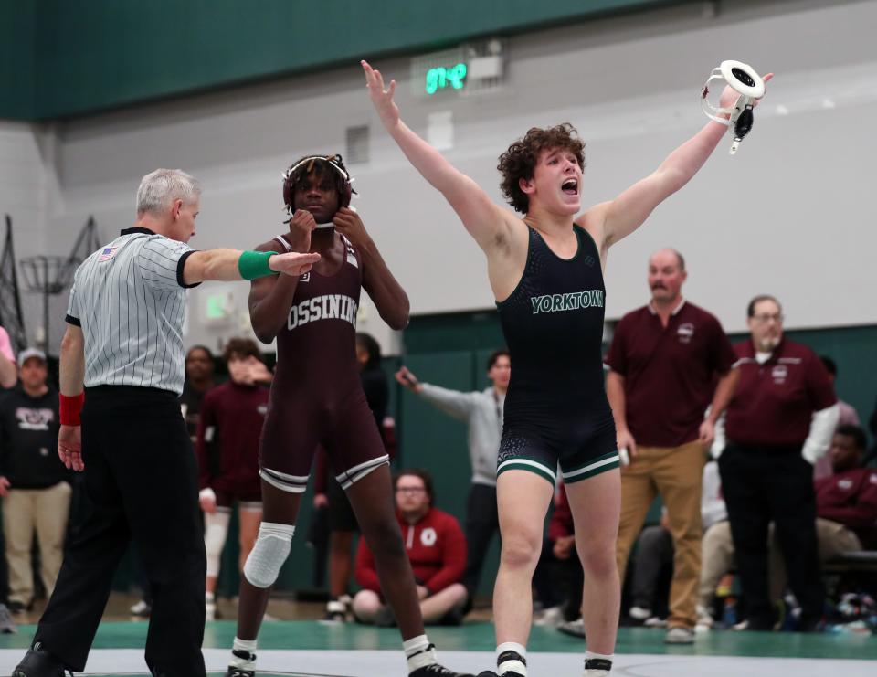 Joe Tornambe from Yorktown and Kayvon Ray from Ossining wrestle in the 145-pound weight class during the Section 1 Division I Dual Meet Tournament at Yorktown High School Dec. 21, 2023. Tornambe won the match.