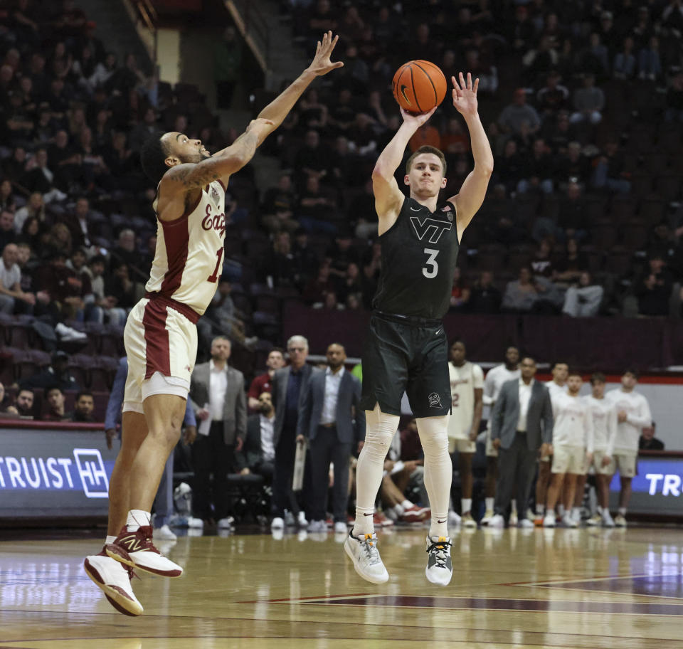 Virginia Tech's Sean Pedulla (3) shoots a 3-point basket against Boston College during the second half of an NCAA college basketball game Tuesday, Jan. 23, 2024, in Blacksburg, Va. (Matt Gentry/The Roanoke Times via AP)