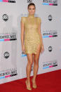 <b>Heidi Klum<br></b><br>The supermodel worked the metallic trend in this gold lace Alexandre Vauthier Couture AW12 mini dress at the American Music Awards in LA.<br><br><b>[Related: <a href="http://uk.lifestyle.yahoo.com/photos/this-week-s-10-best-dressed-celebrities-31-aug-7-sept-slideshow/heidi-photo-1347036905.html" data-ylk="slk:Top 10 best dressed celebrities – Heidi Klum;elm:context_link;itc:0;sec:content-canvas;outcm:mb_qualified_link;_E:mb_qualified_link;ct:story;" class="link  yahoo-link">Top 10 best dressed celebrities – Heidi Klum</a>]</b><br>
