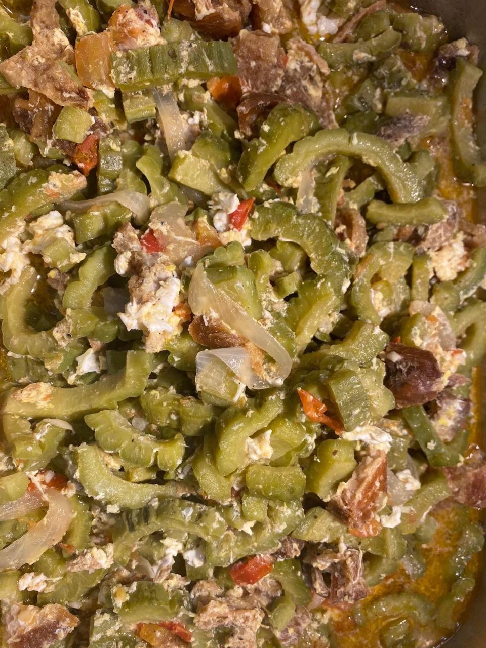 Ginisang ampalaya is bittermelon sauteed with tomatoes, pork and shrimp.