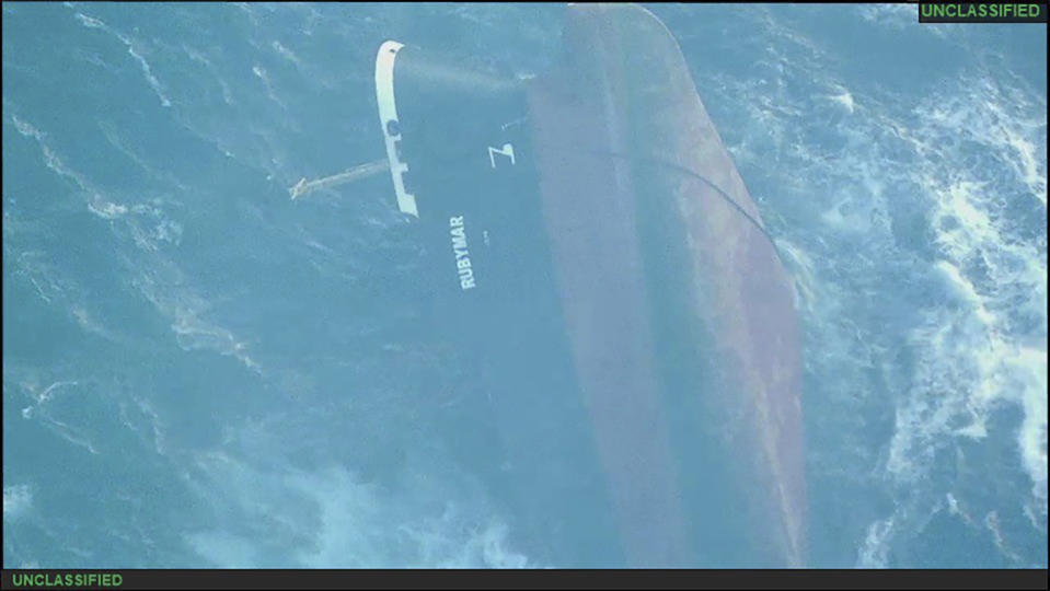 This undated photo released Sunday, March 3, 2024, by the U.S. military's Central Command shows the Belize-flagged vessel Rubymar sinking in the Red Sea. The Rubymar, earlier attacked by Yemen's Houthi rebels, has sunk in the Red Sea after days of taking on water, officials said Saturday, March 2, 2024, the first vessel to be fully destroyed as part of their campaign over Israel's war against Hamas in the Gaza Strip. (U.S. military's Central Command via AP)