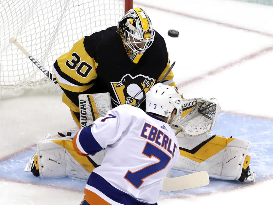New York Islanders' Jordan Eberle (7) puts a shot past Pittsburgh Penguins goaltender Matt Murray (30) for a goal during the first period in Game 4 of an NHL first-round hockey playoff series in Pittsburgh, Tuesday, April 16, 2019. (AP Photo/Gene J. Puskar)