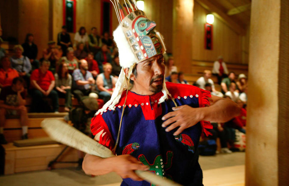 FILE In this photo taken in May of 2005, a Tlingit dancer performs at the Native theater at Icy Strait Point in Hoonah Alaska. An Alaska Native village corporation that operates a popular cruise ship destination has launched a commercial consulting service for others seeking help developing their own cultural tourism ventures. Huna Totem Corp. opened Alaska Native Voices on Wednesday, May 1, 2013. Huna Totem is the village Native corporation for Hoonah, a largely Tlingit community of 775 in southeast Alaska and one of the front-runners of tribal tourism, a growing trend in Alaska and nationally. (AP Photo/Icy Strait Point) NO SALEs