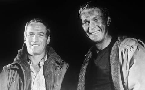Paul Newman (left) and Steve McQueen during filming of The Towering Inferno - Credit: REX/Shutterstock
