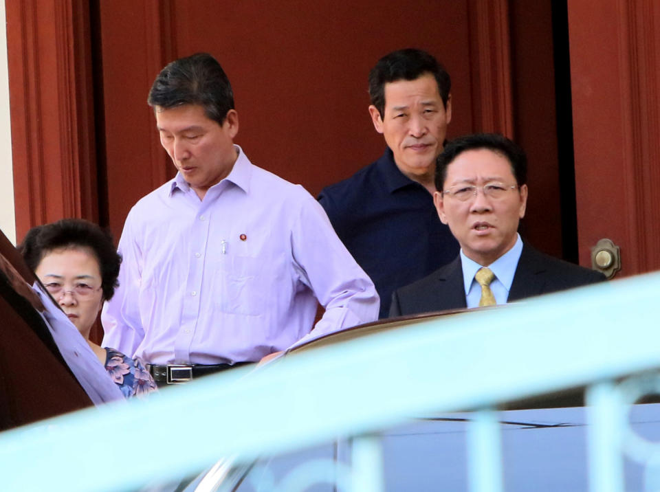 North Korean Ambassador to Malaysia Kang Chol, right, prepares to get on a car at the embassy in Kuala Lumpur, Malaysia, Monday, March 6, 2017. Malaysia is protecting its "sovereignty and dignity" by expelling the North Korean ambassador, Malaysian Prime Minister Najib Razak said Monday, as relations between the countries frayed over the poisoning of Kim Jong Nam, the estranged half brother of North Korea's leader. (AP Photo)