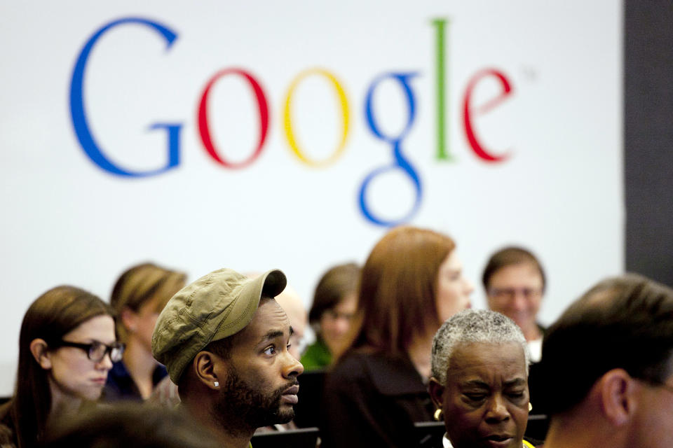 FILE - In this Wednesday, Oct. 17, 2012, file photo, people attend a workshop, "New York Get Your Business Online," at Google offices in New York. Google Inc. reports quarterly earnings on Thursday, Jan. 30, 2014. (AP Photo/Mark Lennihan, File)