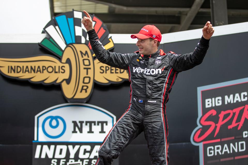 Team Penske driver Will Power (12) celebrates after winning the Big Machine Spiked Coolers Grand Prix on Saturday, Aug. 14, 2021, at Indianapolis Motor Speedway. 