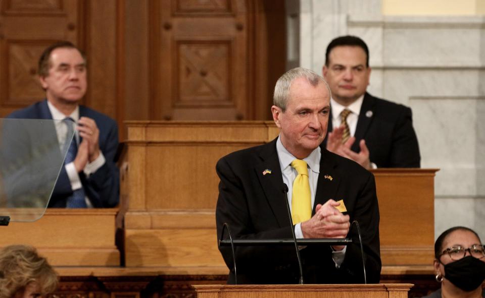 New Jersey Governor Phil Murphy delivers his Budget Address from the Assembly Chamber at the Statehouse in Trenton Tuesday, March 8, 2022.  Behind him are Assembly Speaker Craig Coughlin (left) and Senate President Nick Scutari.