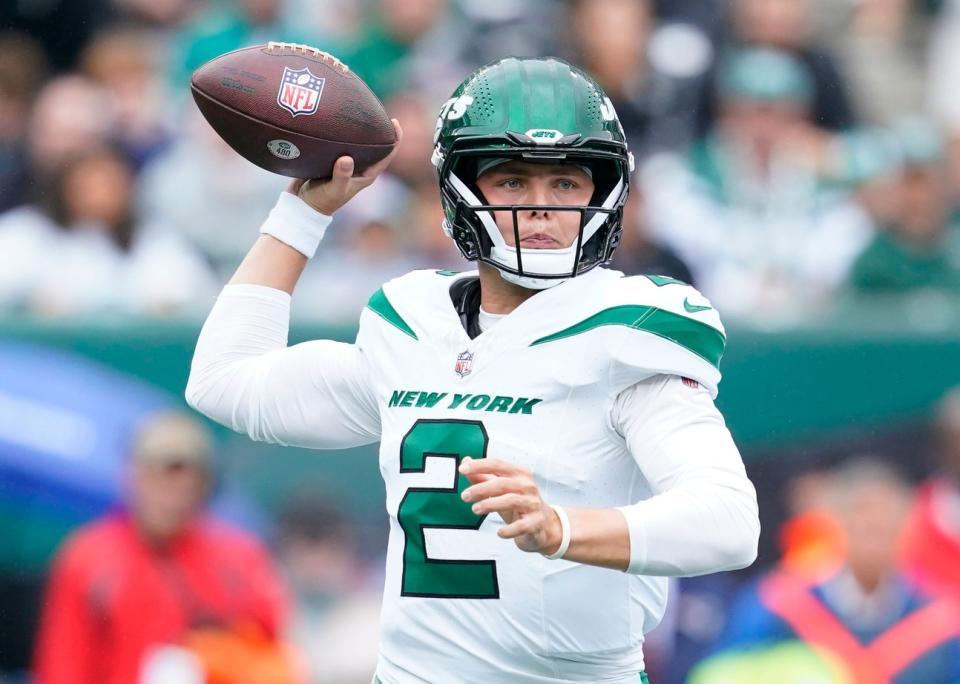 New York Jets quarterback <a class="link " href="https://sports.yahoo.com/nfl/players/33390" data-i13n="sec:content-canvas;subsec:anchor_text;elm:context_link" data-ylk="slk:Zach Wilson;sec:content-canvas;subsec:anchor_text;elm:context_link;itc:0">Zach Wilson</a> throws the ball against the <a class="link " href="https://sports.yahoo.com/nfl/teams/new-england/" data-i13n="sec:content-canvas;subsec:anchor_text;elm:context_link" data-ylk="slk:New England Patriots;sec:content-canvas;subsec:anchor_text;elm:context_link;itc:0">New England Patriots</a> in the first half of his team’s loss 15-10 loss at MetLife Stadium on Sunday. Wilson was 18-36 for 157 yards and no touchdowns.