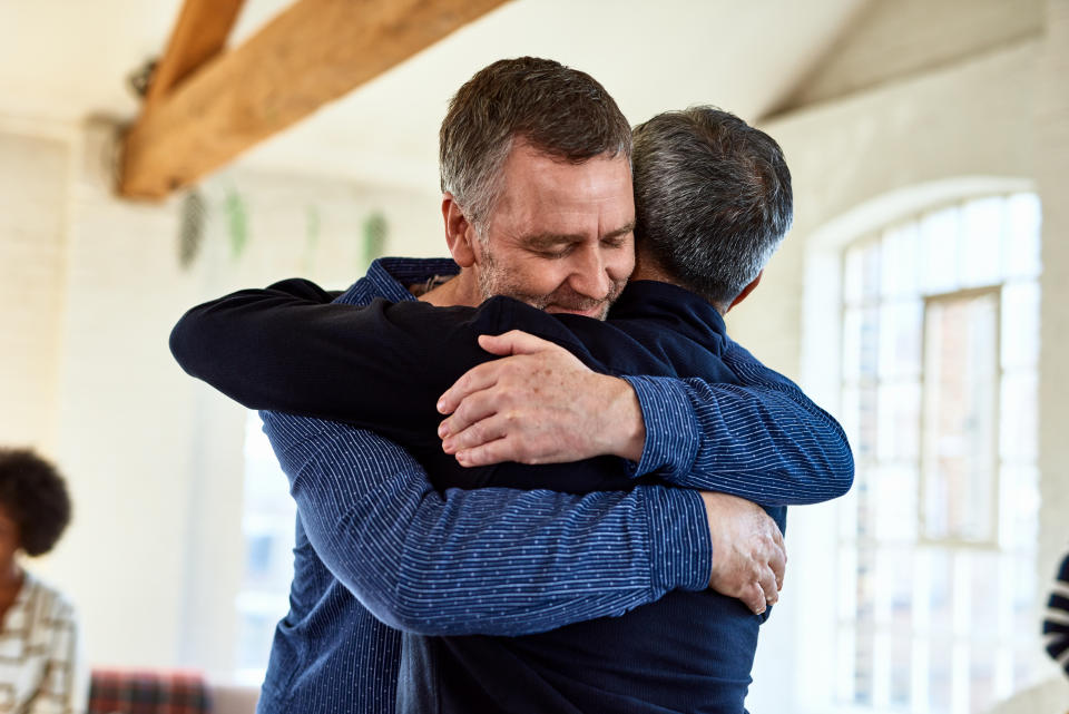 two men embracing