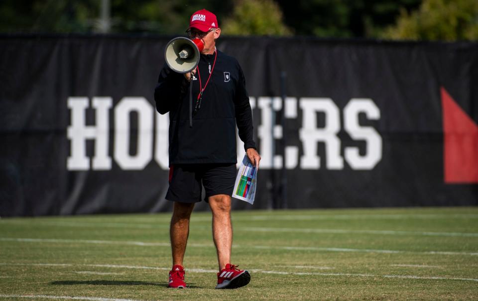 Indiana Head Coach Tom Allen uses his megaphone during Indiana football fall camp at the practice fields on Friday, Aug. 11, 2023.