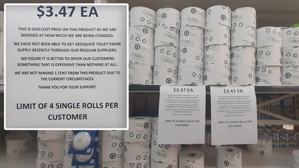 Image of the toilet rolls and sign