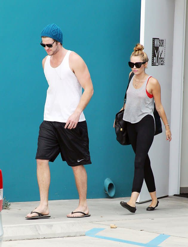 <b>Catching a Workout</b><br>Liam Hemsworth is spotted at a pilates studio in Los Angeles with his fiancé Miley Cyrus in July. Hemsworth, 22, plays Gale Hawthorne in "The Hunger Games" film series.