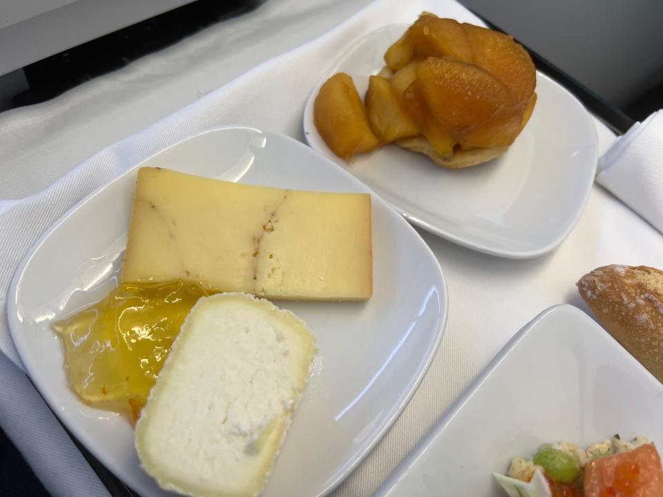 Flying on La Compagnie all-business class airline from Paris to New York — the cheese plate and apple tart.