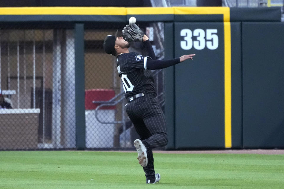 Chicago White Sox's Lenyn Sosa catches a shallow fly ball hit by Philadelphia Phillies' Alec Bohm during the second inning in the second game of a baseball doubleheader Tuesday, April 18, 2023, in Chicago. (AP Photo/Charles Rex Arbogast)