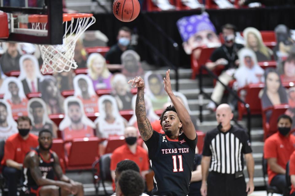 Texas Tech's Kyler Edwards (11) shoots the ball during the second half of an NCAA college basketball game against Baylor in Lubbock, Texas, Saturday, Jan. 16, 2021. (AP Photo/Justin Rex)