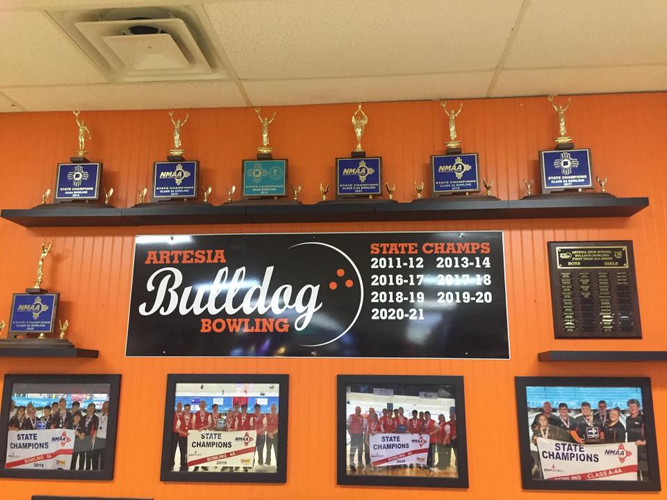 A wall at Artesia Lanes is dedicated to the number of state bowling titles won by Artesia High School.