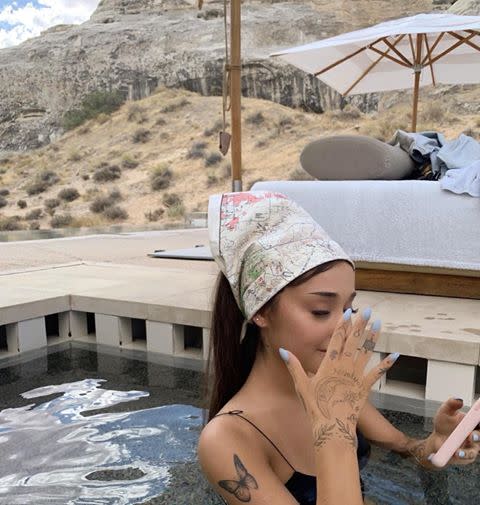 <p>Seemingly in reference to her newest jam "Rain On Me," Ariana added a tiny umbrella just below the olive brand on her thumb. She also got twin vines around her wrist, a trademark of her favorite tattoo artist, <a href="https://www.instagram.com/girlknewyork/" rel="nofollow noopener" target="_blank" data-ylk="slk:Mira Mariah;elm:context_link;itc:0;sec:content-canvas" class="link ">Mira Mariah</a>. </p><p><a href="https://www.instagram.com/p/CDraKMFFakH/" rel="nofollow noopener" target="_blank" data-ylk="slk:See the original post on Instagram;elm:context_link;itc:0;sec:content-canvas" class="link ">See the original post on Instagram</a></p>