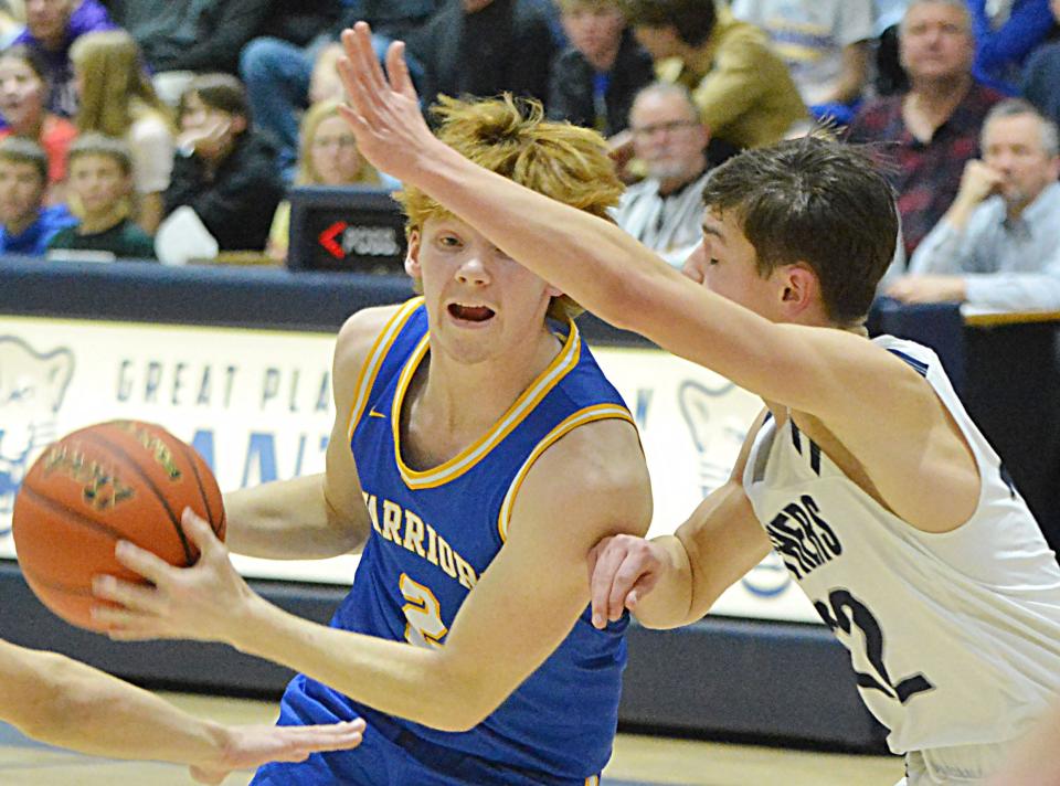 Castlewood's Lane Tvedt (2) is guarded by Great Plains Lutheran's Micah Holien during their high school boys basketball game on Thursday, Jan. 11, 2024 in Watertown. Top-rated Castlewood won 68-38.