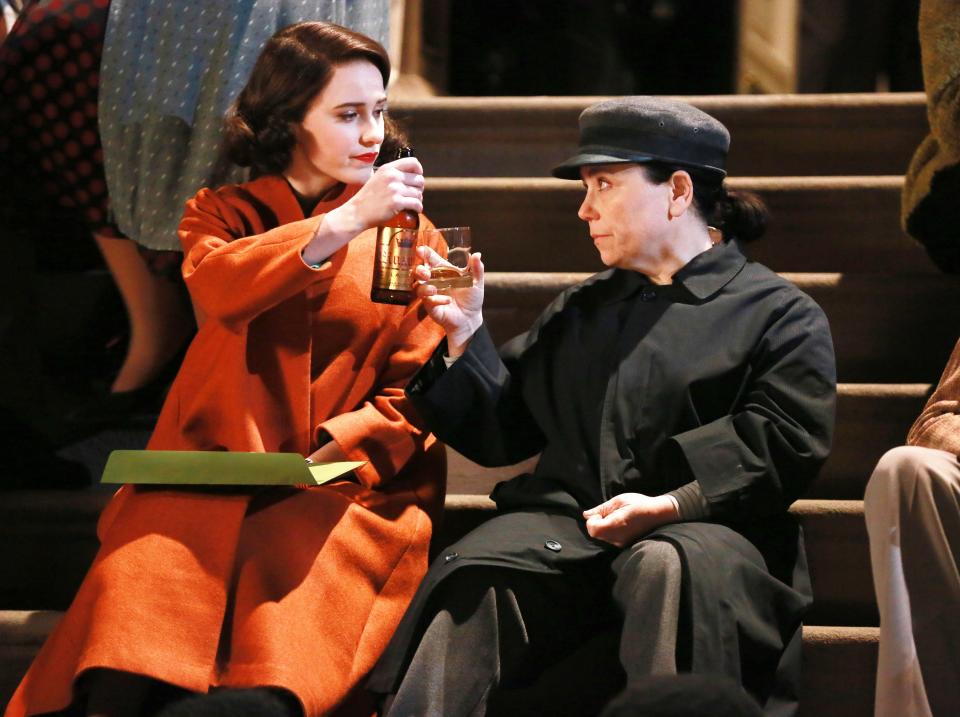 Rachel Brosnahan and Alex Borstein make a toast on the set of <em>The Marvelous Mrs. Maisel </em>on Wednesday in N.Y.C.