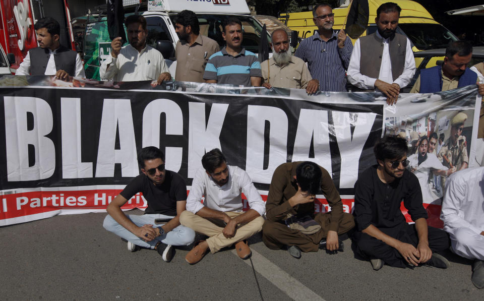 Supporters of All Parties Hurriyat Conference shout slogans during a demonstration to serve Black Day, in Islamabad, Pakistan, Saturday, Oct. 27, 2018. The so called Black Day is being marked throughout the country to express support and solidarity with Kashmiri people in their peaceful struggle for their right to self-determination. (AP Photo/Anjum Naveed)