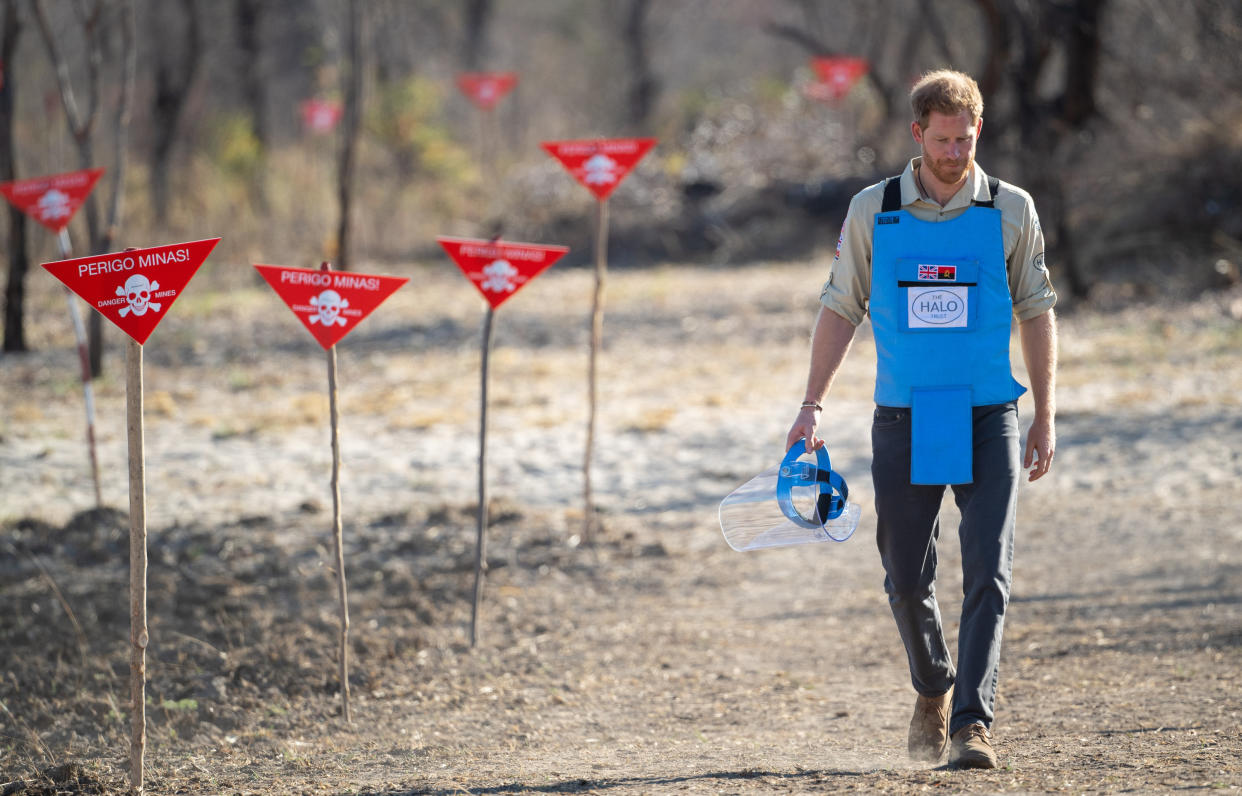 DIRICO, ANGOLA - SEPTEMBER 27: Prince Harry, Duke of Sussex walks through a minefield during a visit to see the work of landmine clearance charity the Halo Trust, on day five of the royal tour of Africa on September 27, 2019 in Dirico, Angola. This is part of the Duke and Duchess of Sussex's royal tour to South Africa. (Photo by Pool/Samir Hussein/WireImage)