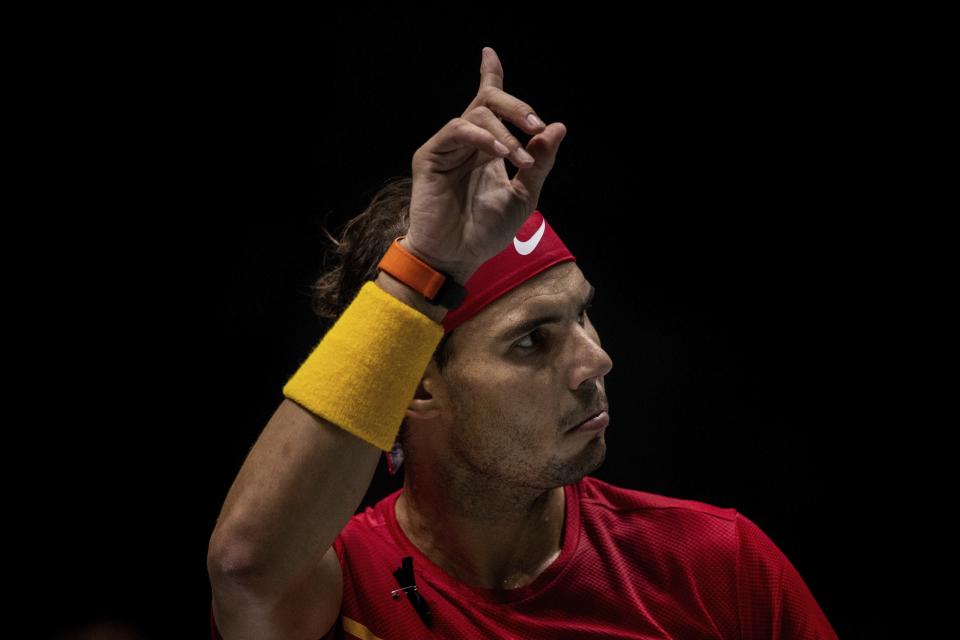 Spain's Rafael Nadal plays against Argentina's Diego Schwartzman during a Davis Cup quarterfinal match in Madrid, Spain, Friday, Nov. 22, 2019. (AP Photo/Bernat Armangue)