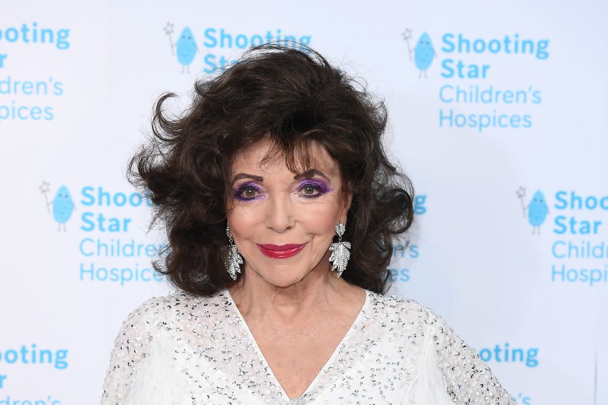 Dame Joan Collins said she wanted to be a boy when going through puberty after ‘hating’ the way her body was changing  (Getty Images)