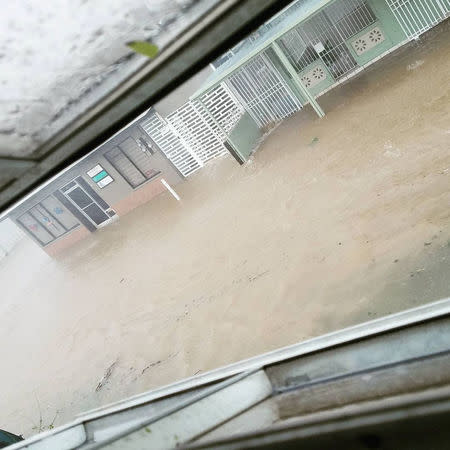 A flooded road is seen after Hurricane Maria hit Puerto Rico September 20, 2017, in this still image taken from social media. INSTAGRAM/highasyourdreams/via REUTERS