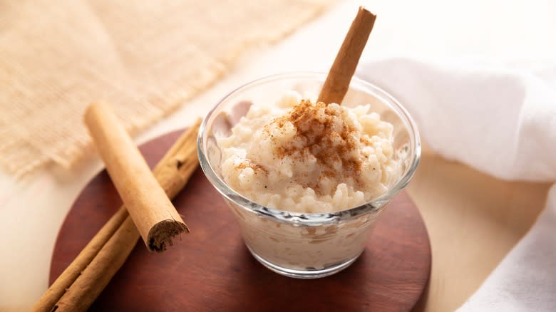 rice pudding with cinnamon stick garnish