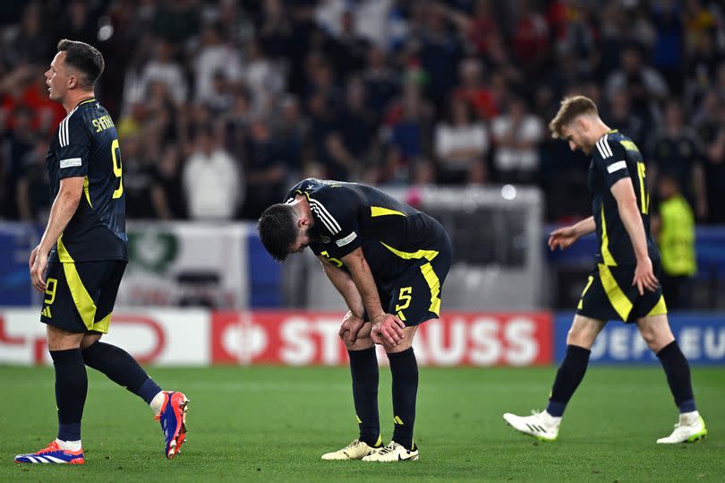 Grant Hanley of Scotland reacts with disappointment