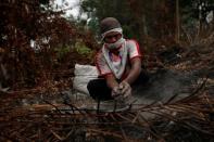 The Wider Image: Indonesia's firefighters on frontline of Borneo's forest blazes