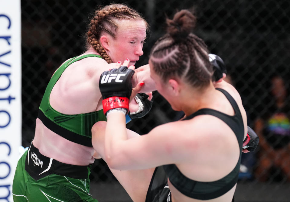 LAS VEGAS, NEVADA – JUNE 04: (L-R) JJ Aldrich punches Erin Blanchfield in a flyweight fight during the UFC Fight Night event at UFC APEX on June 04, 2022 in Las Vegas, Nevada. (Photo by Chris Unger/Zuffa LLC)