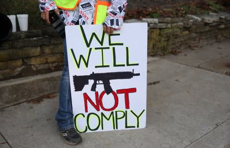 Guns rights activist demonstrates outside the fourth U.S. Democratic presidential candidates 2020 election debate in Westerville, Ohio