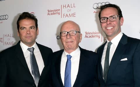 Rupert Murdoch, center, and his sons, Lachlan, left, and News Corp Deputy COO James Murdoch  - Credit: Dan Steinberg