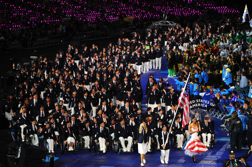 LONDON, ENGLAND - AUGUST 29: Athlete Scott Danberg of United States carries the flag during the Opening Ceremony of the London 2012 Paralympics at the Olympic Stadium on August 29, 2012 in London, England. (Photo by Gareth Copley/Getty Images)