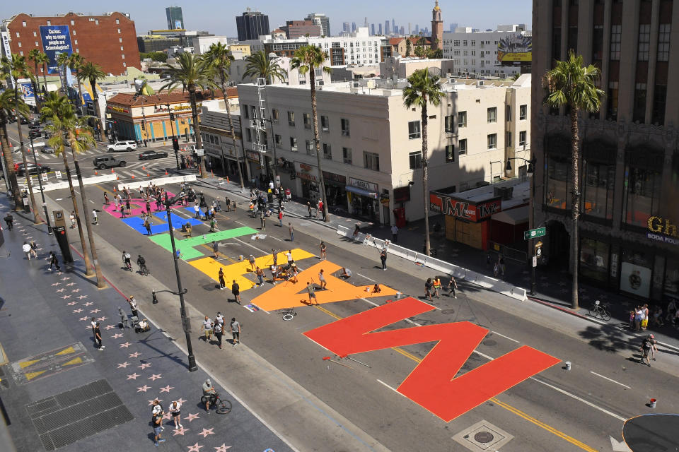 "ALL BLACK LIVES MATTER" is painted on Hollywood Boulevard near the famed Chinese and Dolby theatres, Saturday, June 13, 2020, in the Hollywood section of Los Angeles. (AP Photo/Mark J. Terrill)