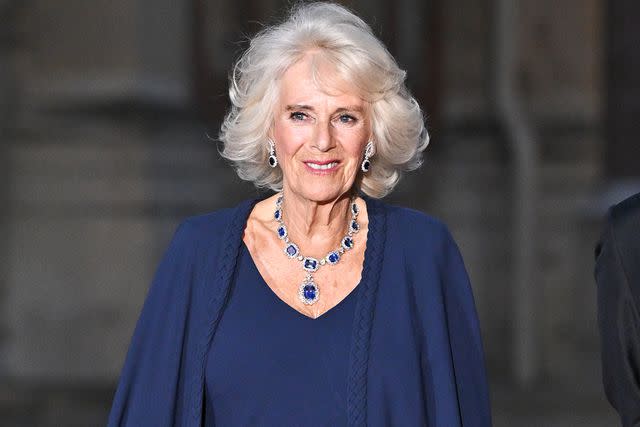 <p>Stephane Cardinale - Corbis/Corbis via Getty Images</p> Queen Camilla arrives at the Palace of Versailles on Sept. 20