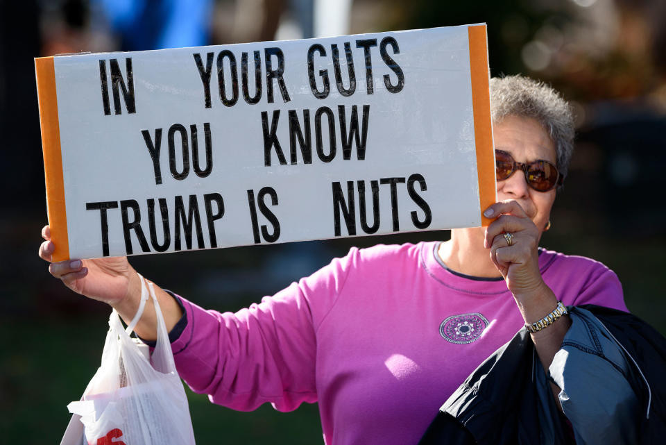 Anti-Trump protesters gather as Electoral College votes