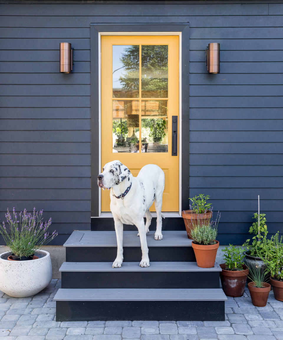 Spring door decor with yellow painted front door